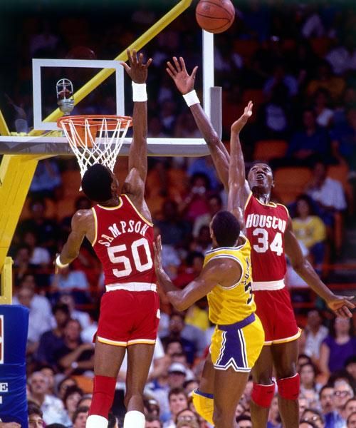 Ralph Sampson And Hakeem Olajuwon VS Magic Johnson Photo by